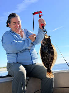 Nice Southern flounder on light tackle using deep sea jigging techniques!