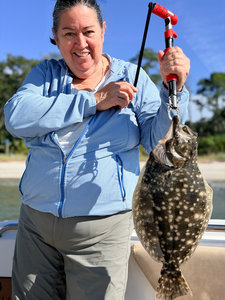 Nice Southern Flounder using deep sea jigging and light tackle before the afternoon rain rolled in.