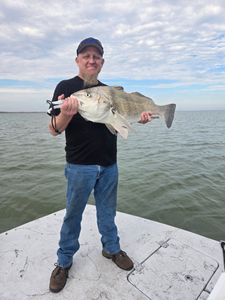 A person enjoying a fishing cruise in Corpus Christi