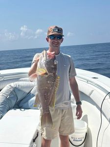 One person fishing on the beach in Panama City Beach