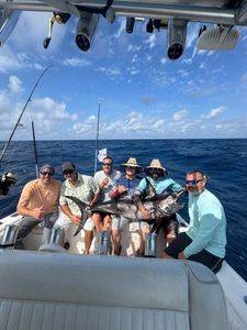 Group of 6 people fishing in FL
