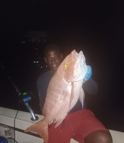 Lone angler fishing in Andros Town