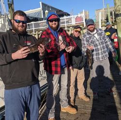 5 people fishing with 2 fish in NJ