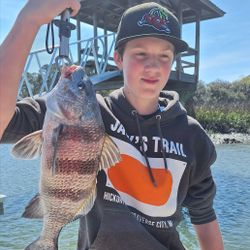 A person fishing for a black drum fish on Hilton Head Island.