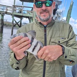A person fishing for a black drum on Hilton Head Island
