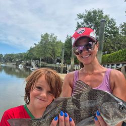 A person fishing for a large black drum fish on Hilton Head Island