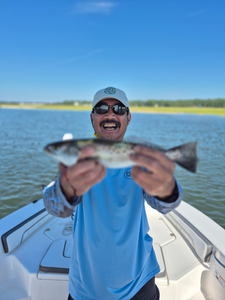 Great catch using jigging and trolling techniques in clear conditions!