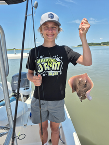 Stormy skies can't dampen the thrill of light tackle fishing!