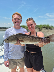Big redfish hooked on a cloudy day in Hilton Head!