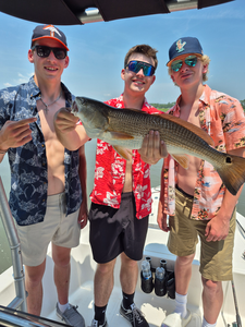 Big redfish reeled in on a clear day in Hilton Head!