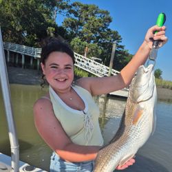 A person fishing on the shores of Hilton Head Island