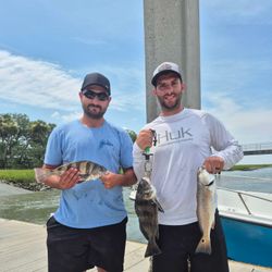 Three black drum and redfish caught fishing in SC