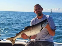1 fisherman reeling in line in Kent