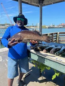 Single angler catching large fish at Fort Pierce