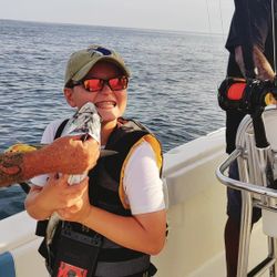 Angler with 10-inch fish caught at Fort Pierce