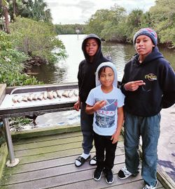 Three people fishing in Fort Pierce
