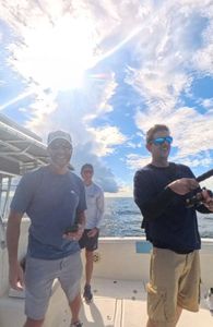 Three people fishing at Fort Pierce