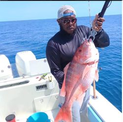 Angler with a huge 24-inch fish in FL