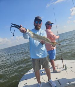 Two anglers fishing in Corpus Christi with best fishing equipment