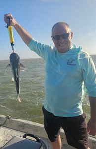 Freshly caught fish being held up on fishing boat in Corpus Christi TX waters