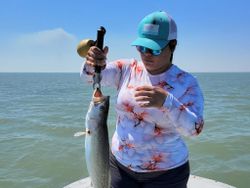 A person fishing in TX