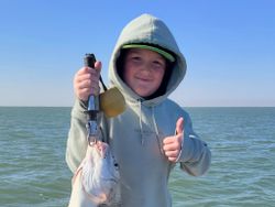 A person fishing in Corpus Christi