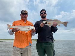 Two redfish, 19-inch fish caught while fishing in TX
