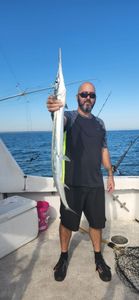 Photograph of a 39-inch American Eel caught while fishing in VA