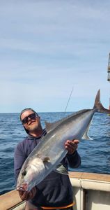 Angler catches a fish at the Norfolk fishing spot