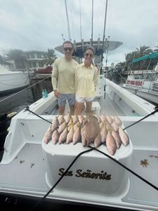 Successful yellowfin fishing trip in Tavernier FL showing large catch displayed on boat deck