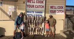 Four people fishing in TX