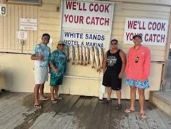 Group of friends enjoying the best fishing experience at South Padre Island