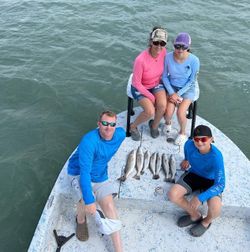 4 people fishing in TX