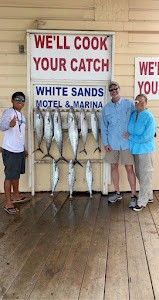 Three people enjoying a fishing trip in TX