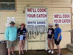 Group of 4 people enjoying a day at South Padre Island