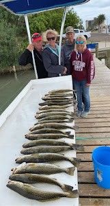 Two people fishing in TX