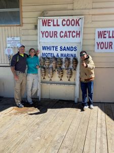 Three people fishing at South Padre Island