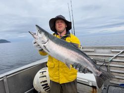 A single coho salmon being caught while fishing in Alaska