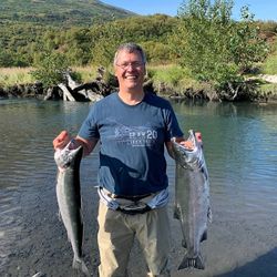 Two Coho Salmon, 22 inches long, caught while fishing in AK