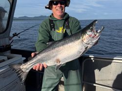 Coho salmon being caught while fishing in Larsen Bay