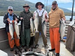 Seven coho salmon and rainbow trout caught while fishing in Larsen Bay