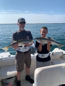 Life’s better with a striper fish in hand.
