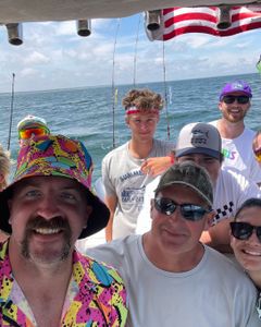 A group of 5 people enjoying a fishing tour in East Dennis