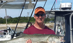 Fishing tour in East Dennis, Massachusetts with a big 28-inch catch