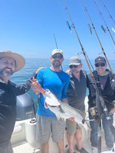 4 people enjoying fishing tours in East Dennis