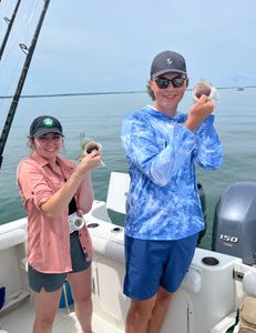 Two people fishing in MA