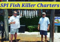 A pair of anglers fishing on the shores of South Padre Island