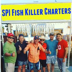 7 people on the beach fishing at South Padre Island
