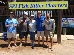 Group of 6 people fishing at South Padre Island