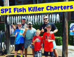 Group of 7 people fishing at South Padre Island